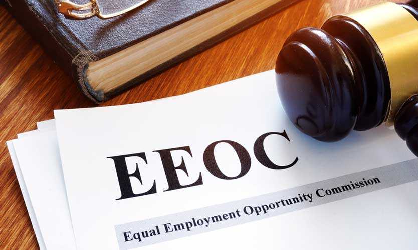 A close up of an eeoc document