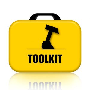 A yellow tool kit with the word " toolkit " written on it.